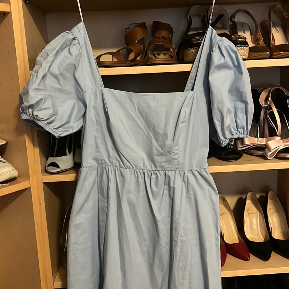 Summer long dress with slit at the bottom. Never worn